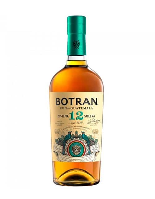 Botran rum bottle with green cap on a white background