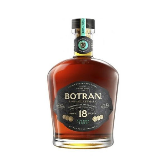 Bottle of Botran rum on a white background