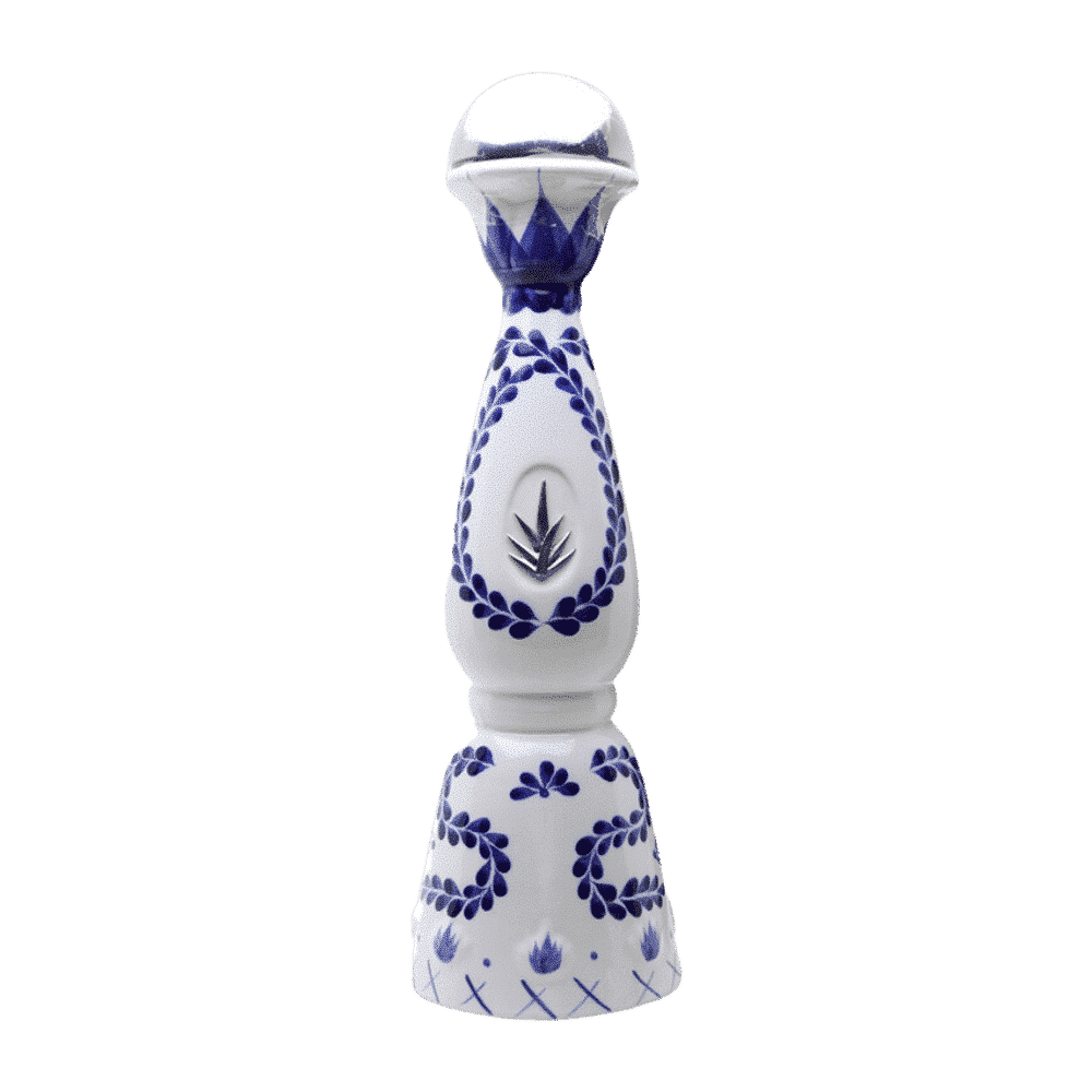 White ceramic pepper grinder with blue floral patterns on a green background