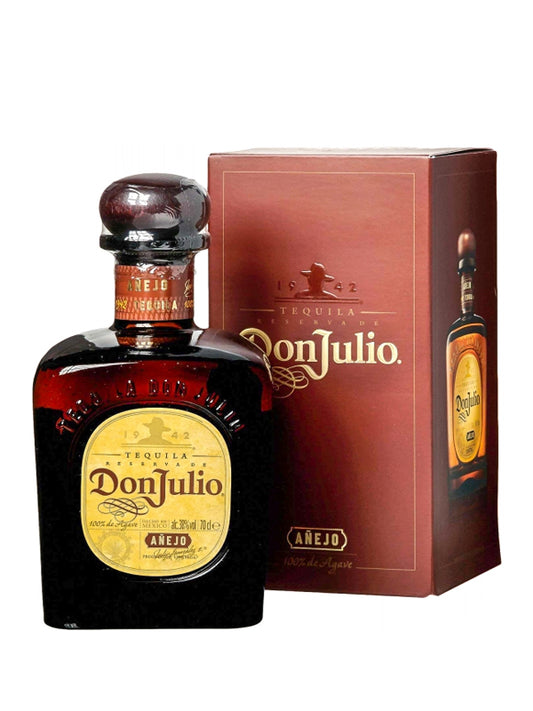 Don Julio tequila bottle and box on a white background