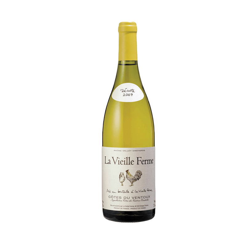Bottle of La Vieille Ferme white wine on a green background